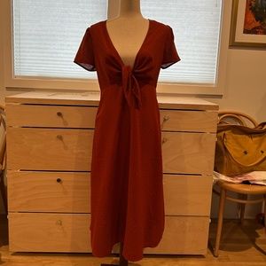 NWT re:named midi dress, size M, in dark orange with black dots.
